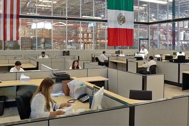 Cromex offices, with the United States and Mexico flags