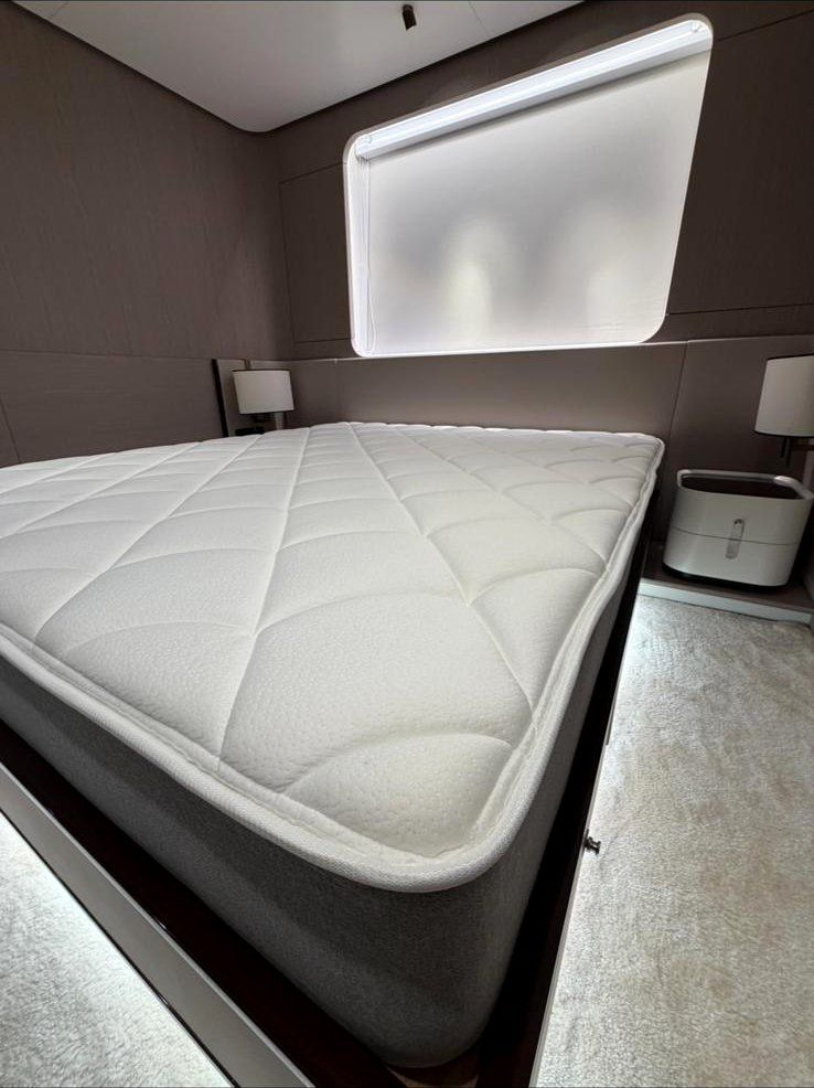 Quilted mattress in a yacht cabin