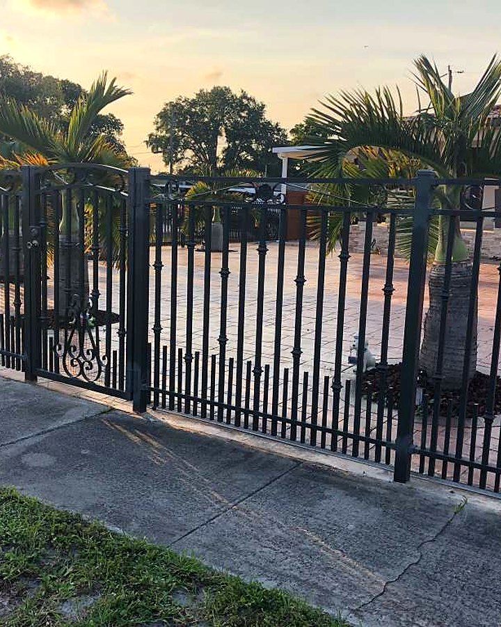 Iron fence along a lawn