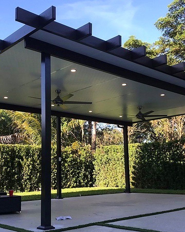 Aluminum pergola with recessed lights and ceiling fans